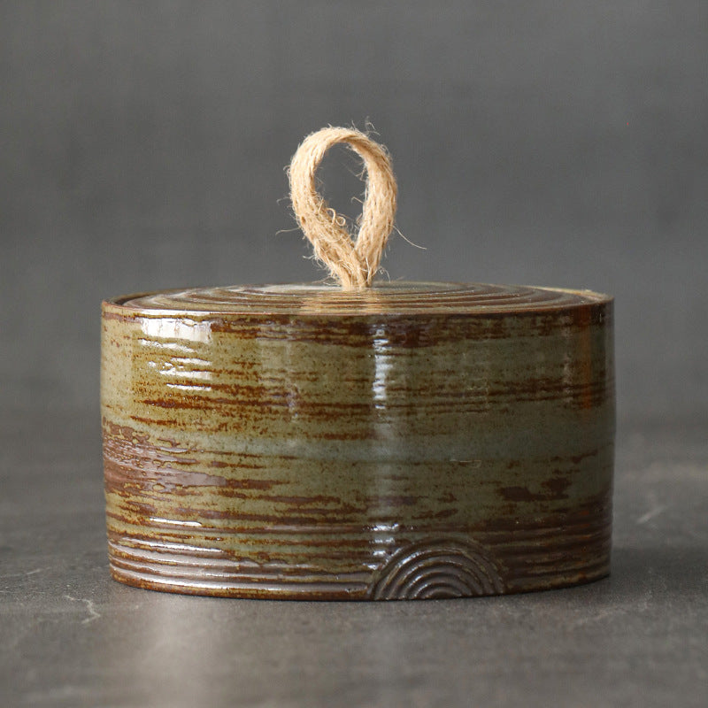 צנצנת קרמיקה עגולה חום וירוק זית ידית יוטה